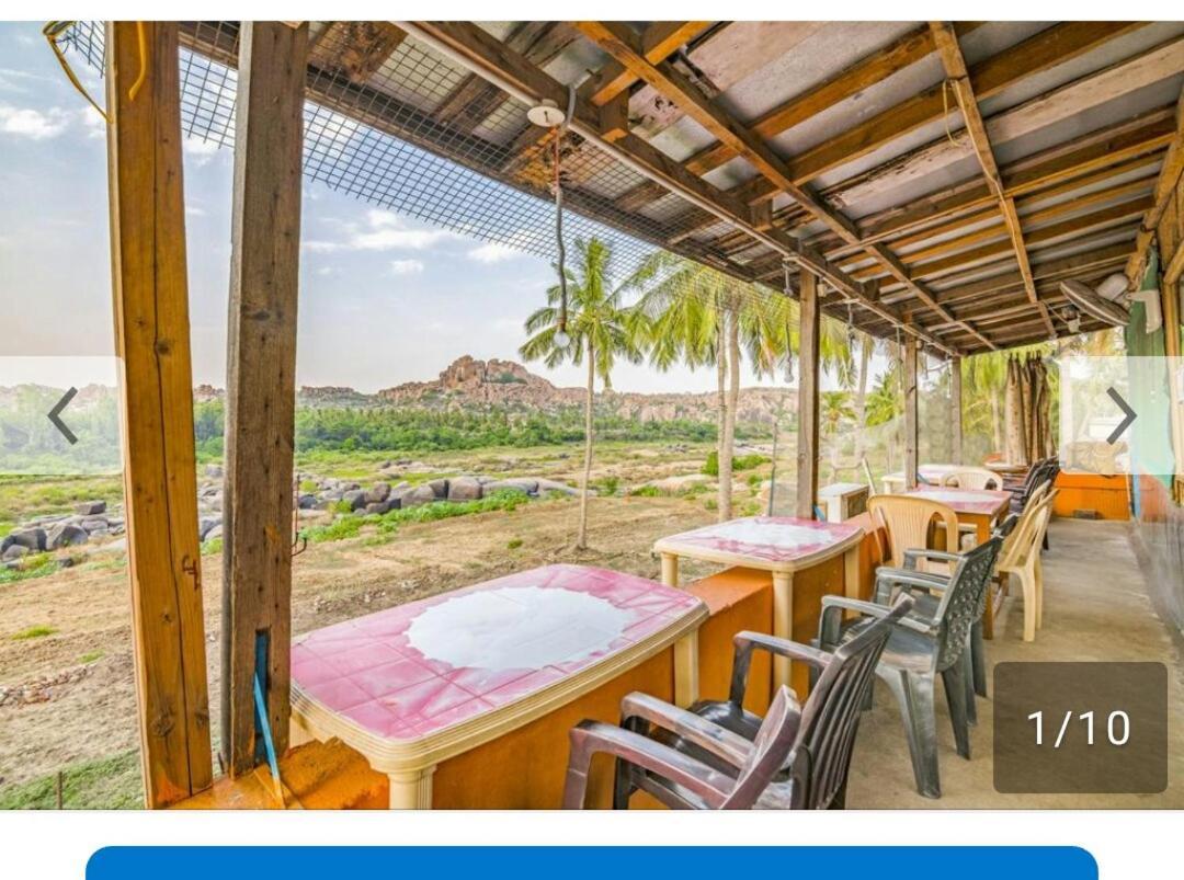 האמפי Archana Guest House River View מראה חיצוני תמונה